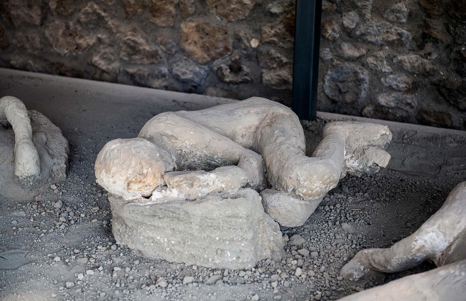 <p>One of the most distinctive symbols of Pompeii is the series of plaster casts that recreate in 3D reality the dying moments of many of the victims, another legacy of Fiorelli’s pioneering techniques that is still in use today. He realised there were gaps in the dense crust of rock and ash and deduced this must be where organic matter had rotted away.</p>  <p>By carefully pouring in plaster of Paris to the empty spaces, then gently removing the surrounding ash, he brought to life the facial expressions, clothes and final poses of the people of Pompeii, in surprising – and heart-rending – detail.</p>