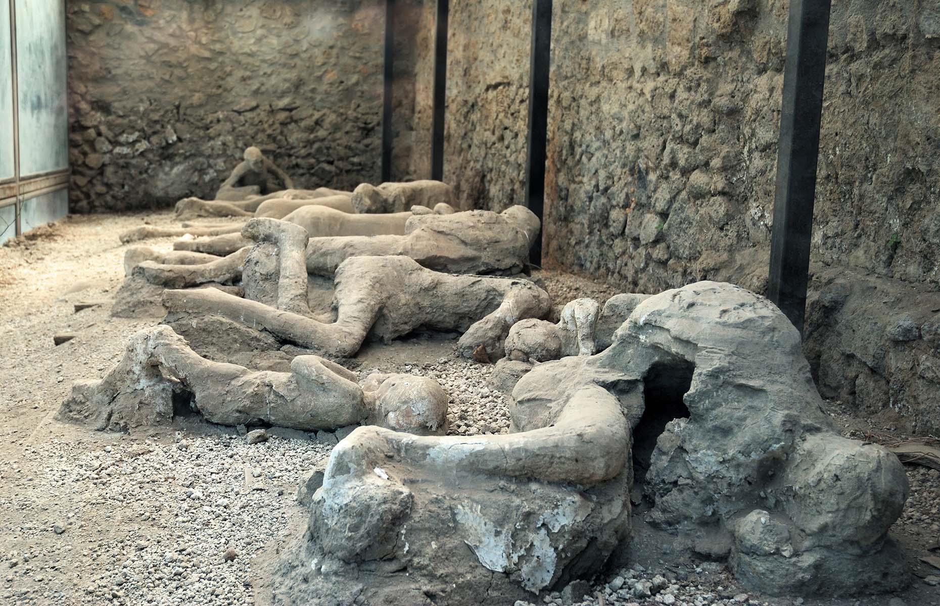 <p>Flows of lava and toxic gases continued for days, long after there was any hope of survival, leaving Pompeii and Herculaneum buried under dense layers of ash at a whopping 20 feet (6-7m) and 66 feet (20m) thick respectively. This offers a clue as to why the smaller town is less-known than its headline-grabbing counterpart, as it was buried deeper and took longer to excavate than Pompeii.</p>  <p>Yet in both cases, the ash preserved not only the bodies of the volcano’s victims, but also surprising insights into daily life in this Roman riviera.</p>