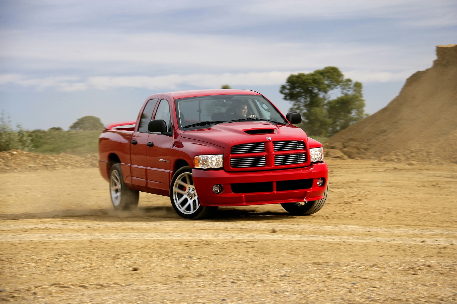 <p>Marrying a <strong>pick-up truck</strong> and the 8.3-liter V10 motor from a sports car might sound like a <strong>shotgun</strong> wedding, but nobody seemed to mind at Dodge. At a stroke, it created the Ram SRT-10 complete with engine from the Viper. Fittingly for a pick-up, the engine was remarkably simple with only two valves per cylinder and naturally aspirated, so no turbos here.</p><p>When it arrived in 2004, the Ram SRT-10 caused a storm as it had over <strong>500 hp</strong> on tap and could <strong>154mph</strong> flat out. Use the engine’s full potential and it could also cover 0-60mph in <strong>4.9 seconds</strong> if you stuck with the lighter regular cab model. This shorter cab version came with a <strong>six-speed manual</strong> as standard, but the five-seat Quad Cab model had a four-speed auto transmission as its only option.</p>