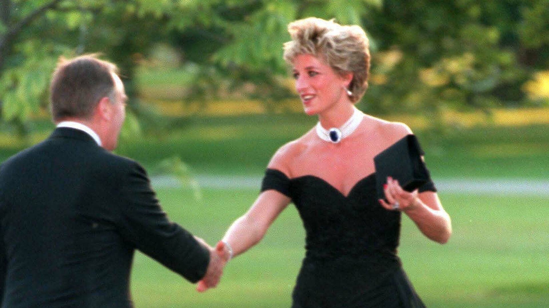 <p>                     A moment that will never be forgotten. The moment Princess Diana stepped out in the controversial dress, now more commonly known as The Revenge Dress, the same night as the news broke of Prince Charles's affair. Diana wore it in 1994 to a dinner at the Serpentine Gallery in Kensington Gardens.                   </p>