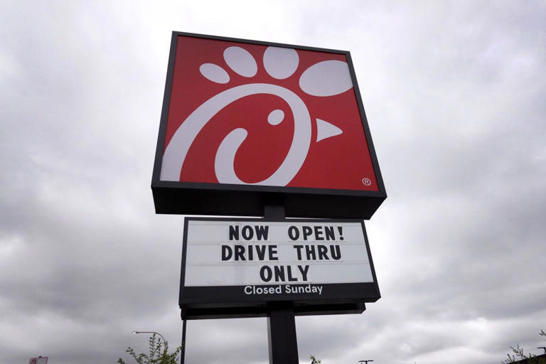 A sign hangs outside of a Chick-fil-A restaurant on May 06, 2021 in Chicago, Illinois. 