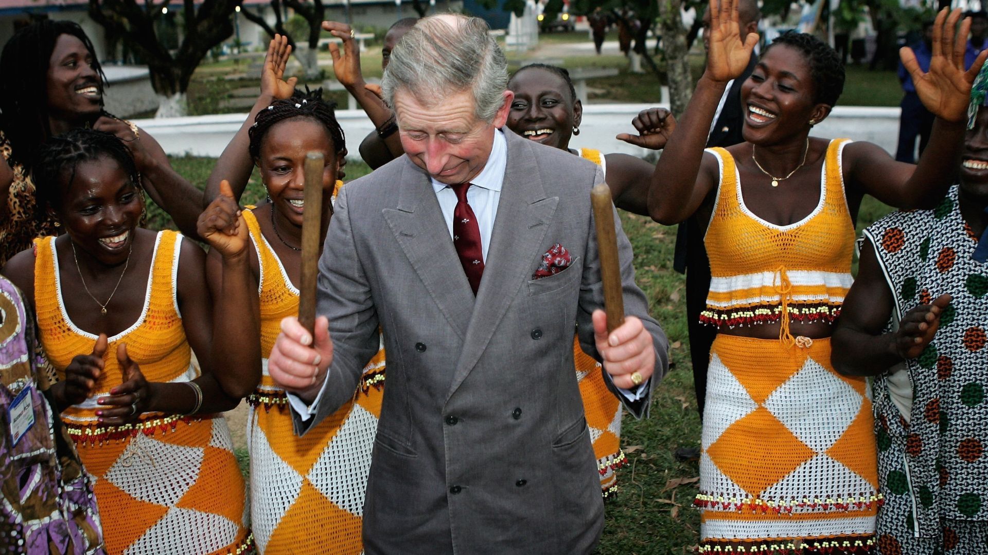 <p>                     Visiting Freetown, the capital of Sierra Leone in 2006, Prince Charles watched a brief performance by the National Dance Group of Sierra Leone which featured drummers in national colours and dancers in white and gold dresses. The then-Prince was offered a pair of drumsticks and couldn’t refuse, he joined the group with a smile on his face.                   </p>