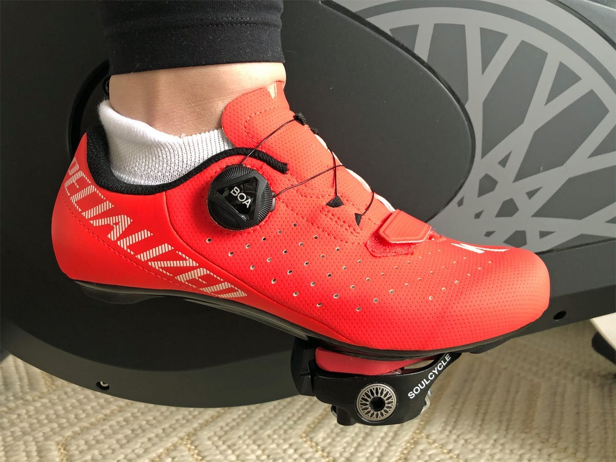 <div class="bi-product-card"><div class="product-card-options"><div class="product-card-option"><div class="product-card-button"><a href="https://www.competitivecyclist.com/specialized-torch-1.0-cycling-shoe-mens"><span>$109.99 FROM COMPETITIVE CYCLIST</span></a></div></div></div></div><ul><li><strong>Size range: </strong>36 - 49</li><li><strong>Fit:</strong> True to size</li><li><strong>Closure:</strong> 1 BOA dial, 1 Velcro strap</li><li><strong>Cleat compatibility:</strong> Look Delta</li></ul><p><strong>Pros:</strong> More affordable than a typical BOA shoe, added padding under tongue, fits true to size, lightweight, comes in bold colors</p><p><strong>Cons:</strong> Velcro strap at toes is thin, no specialized women's/men's fits, compatible with Look Delta cleats only</p><p>Where many cycling shoes limit their color palettes to black and white with the occasional pop of color, the Torch 1.0 shoes from Specialized go bold with offerings of neon red, green, and blue. Of course, you can still get a black or white pair if you want to keep it simple, but those bold colors — along with the very friendly price point for a shoe with these features — were what first attracted me to this pair.</p><p>The shoes back up some flashy presentation with a very similar closure style to the Giro Cadets. A BOA closure gives you excellent uniform support, while a Velcro strap towards the toes aims to prevent toe shift. The Velcro strip on the Torch 1.0s isn't as robust as the one on the Cadets, so I'm not sure it does a ton of work, but it does add some peace of mind.</p><p>A unique feature of the Torch 1.0s is some additional padding under the tongue, which gives you a bit more comfort on the upstroke as you pedal. It's nothing that affects the fit of the shoe too drastically, and it doesn't add any bulk, but it's a nice touch on a part of the shoe that is often neglected.</p><p>Though Specialized sees the Torch 1.0 as a beginner road cycling shoe, it checked all my boxes for a great shoe for spin class — supportive fit with no pain points or hot spots, great ventilation, and my mind wasn't on my feet while I rode.</p><p>The main shortcoming here is that Specialized doesn't offer a specific men's or women's fit, so if the construction of the shoe doesn't work for your foot's anatomy, there's no alternative fit to try. The Torch 1.0s are also the only shoe we recommend that isn't compatible with SPD cleats, though we recommend Look Deltas for spinning anyway.</p>