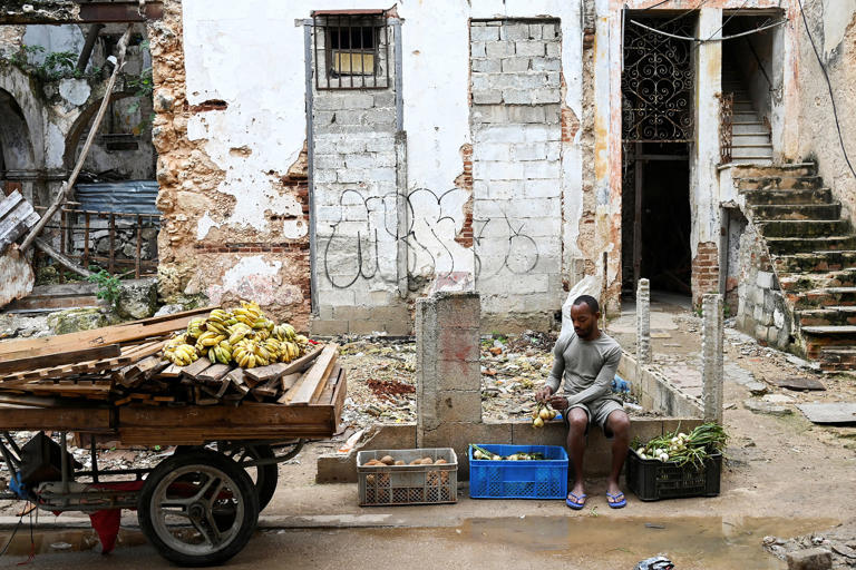 cuba inflation economy fruit vegetable vendor (Yamil Lage / AFP - Getty Images)