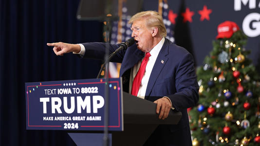 Republican presidential candidate and former U.S. President Donald Trump speaks at a campaign event on December 19, 2023 in Waterloo, Iowa. Scott Olson/Getty Images