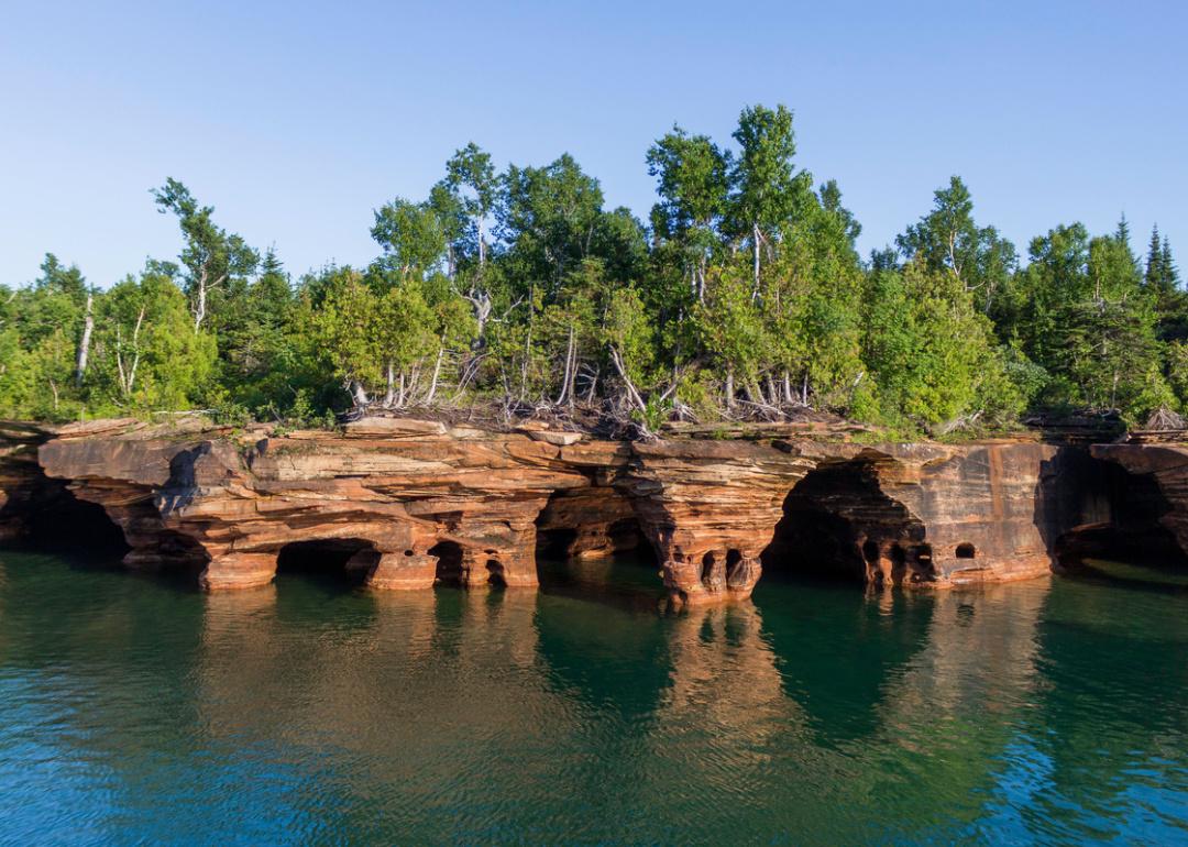 <p>Wisconsin's Lake Superior is home to a whopping 22 islands collectively known as the <a href="https://www.nps.gov/apis/index.htm">Apostle Islands</a>, which offer a secluded escape to visitors. A major highlight is the islands' gorgeous natural <a href="https://www.nps.gov/apis/mainland-caves-winter.htm">ice caves</a>, which you can explore via kayak in the spring and summer.</p>