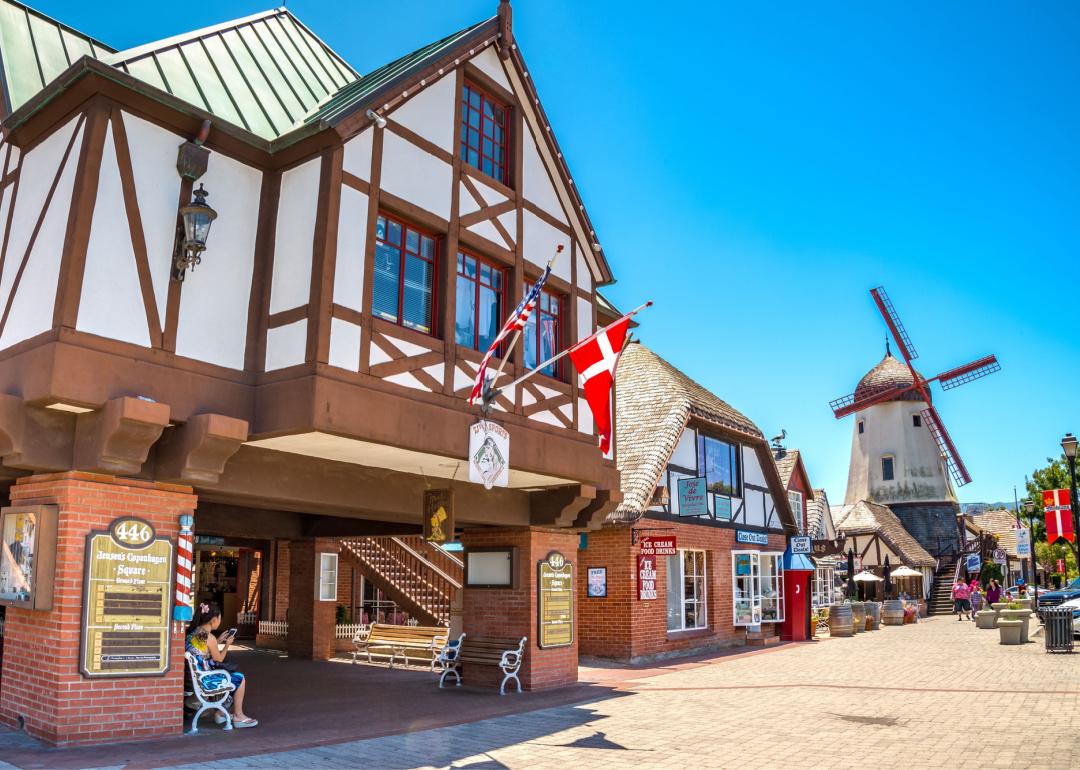 <p>Tucked away just two hours from Los Angeles, the quaint town of Solvang, California, is modeled after Denmark and Spain. With its Copenhagen-esque <a href="https://mermaidsofearth.com/mermaid-statues-mermaid-sculptures/public/the-little-mermaid-statue-in-solvang/">mermaid statues</a> and <a href="https://missionsantaines.org/">Spanish cathedrals</a>, you'll be surprised you're not in Europe! Solvang is also conveniently close to Santa Barbara wine country so you can top off your trip with some wine tasting.</p>