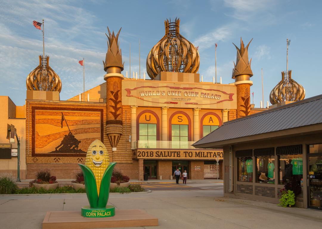 <p>While it might not be one of the buzziest tourist traps, the tiny town of Mitchell, South Dakota, draws over 500,000 annual visitors thanks to its local <a href="https://cornpalace.com/">Corn Palace</a>. Built in 1892, the palace is made entirely of corn and corn husks. It hosts a <a href="https://cornpalace.com/35/Corn-Palace-Festival">yearly festival</a> to celebrate the state's main crop each August.</p>
