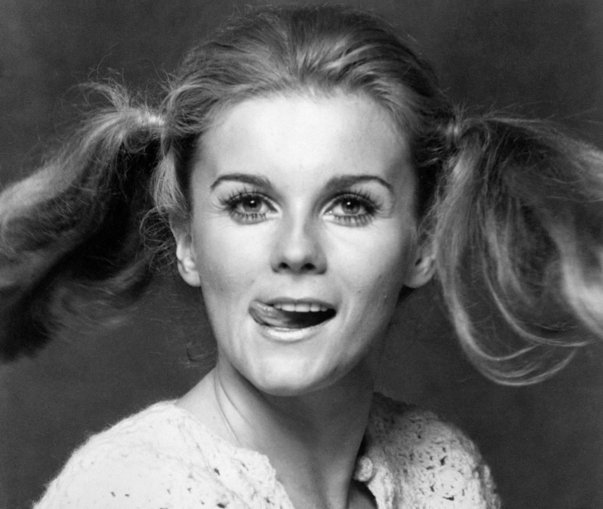 <p>A certified star by 1965, Ann-Margret Being has a career in the entertainment industry that spans over five decades. Starring in films with huge acts such as Elvis in <i>Viva Las Vegas</i> surely helped her rise to fame! </p> <p>But, she didn't seem to let the celebrity status go to her head. As we can see in this beautiful black and white photograph, Ann-Margret Being still had time to goof off in front of the camera!</p>