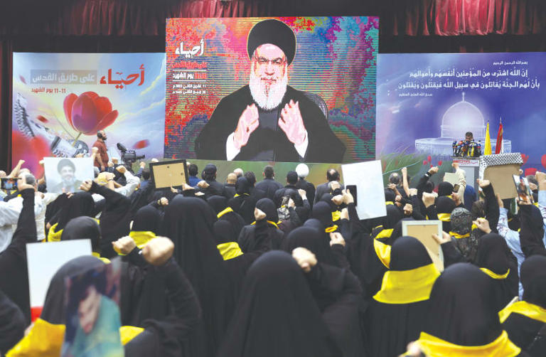  HEZBOLLAH LEADER Hassan Nasrallah addresses his supporters during a rally commemorating the annual Hezbollah Martyrs’ Day, in Beirut last month. 