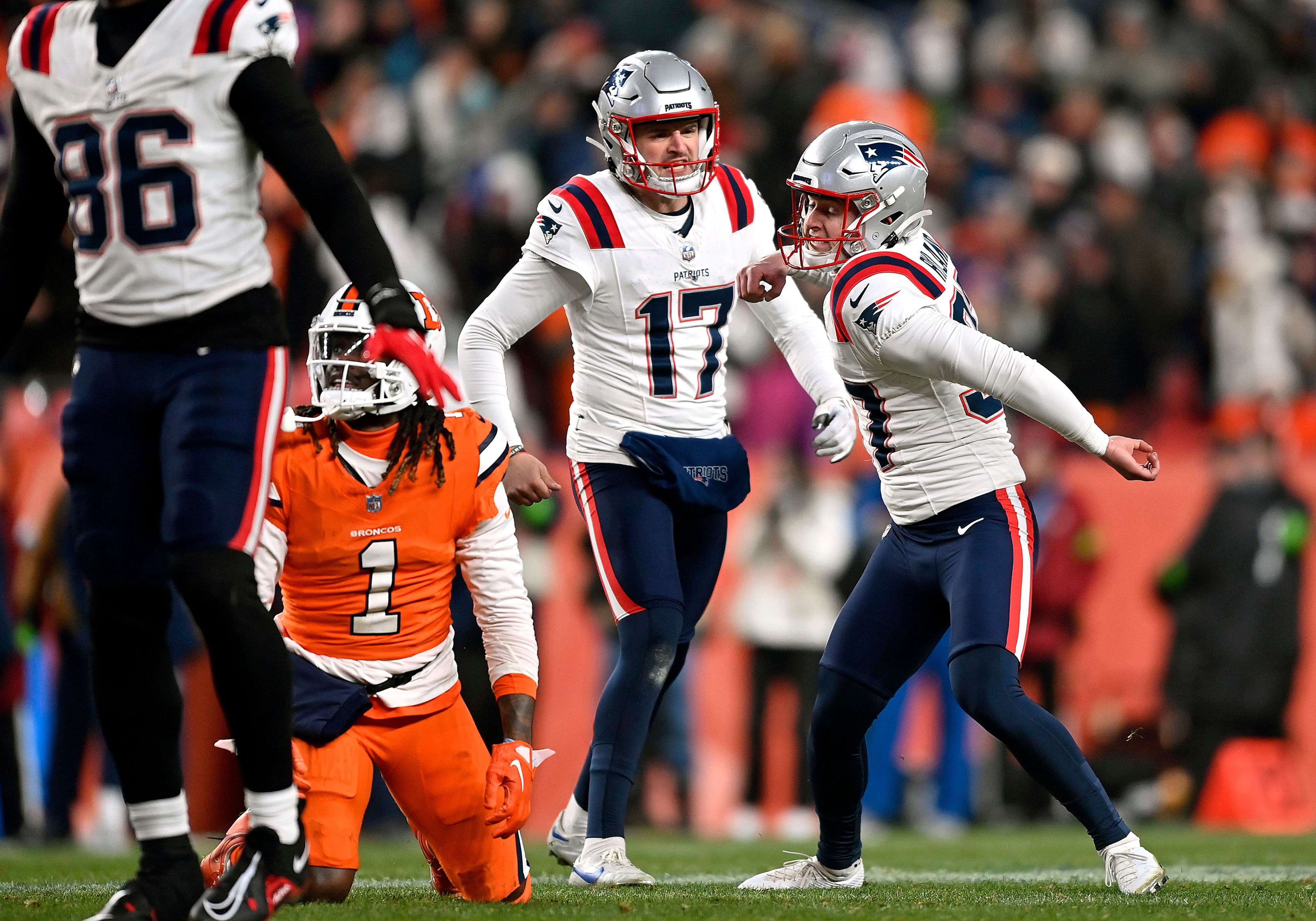 Kicker Chad Ryland (right) kicked a 56-yard field goal to lift the Patriots to a victory in Denver on Sunday.