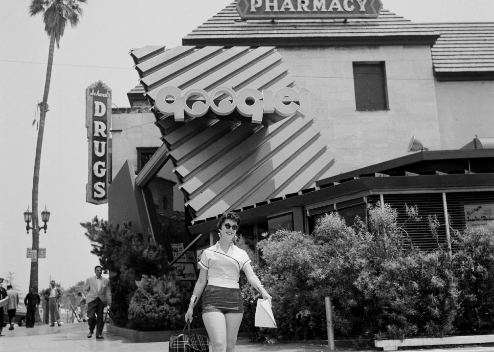 <p>Googie architecture touched down in Los Angeles in 1949 thanks to John Lautner's futuristic design of the long-gone Googie's Coffee Shop in Hollywood. Even though Lautner designed mostly private residences (<a href="https://www.realtor.com/news/celebrity-real-estate/gwyneth-paltrow-garwood-residence/">like the one Gwyneth Paltrow bought in 2014</a>), his style and fixation with the Space Age set the path for his architectural style (initially belittled by his peers) to become one of a kind.</p>  <p>Bold structures and upswept roofs combined with glass, neon, and fluorescent lights invaded the streets of Los Angeles and neighboring cities and later expanded to Las Vegas, Seattle, Phoenix, New York, and beyond.</p>  <p>From the late 1940s and far into the 1960s, roadside businesses—gas stations, motels, car washers, drive-in restaurants, coffee shops—as well as entertainment venues, like bowling alleys, cinemas, auditoriums, and even churches, started evoking flying saucers, launching pads, and airstrips, while commercial signage began displaying stars, blasts, boomerangs, parabolas, comets, and other astronomical and atomic figures.</p>  <p>This combination of galactic shapes with neon outlines couldn't be ignored and would become a staple of the American midcentury lifestyle, not to mention an effective marketing tool to attract passing motorists. The golden arches of McDonald's, originally an architectural feature of the restaurant and later the main element of its logo, were conceived during this time.</p>  <p>Using various architectural, design, news, and travel sources, <a href="https://www.livingspaces.com/">Living Spaces</a> chose five iconic Googie buildings that hark back to simpler times, when outer space seemed just within reach and flickering lights on the way home compelled people to imagine the future.</p>