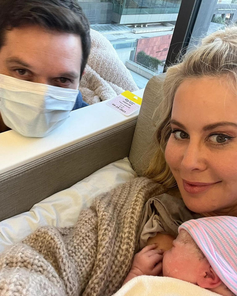 The retired figure skater and her husband welcomed a baby girl named Georgie Winter via surrogate in October.