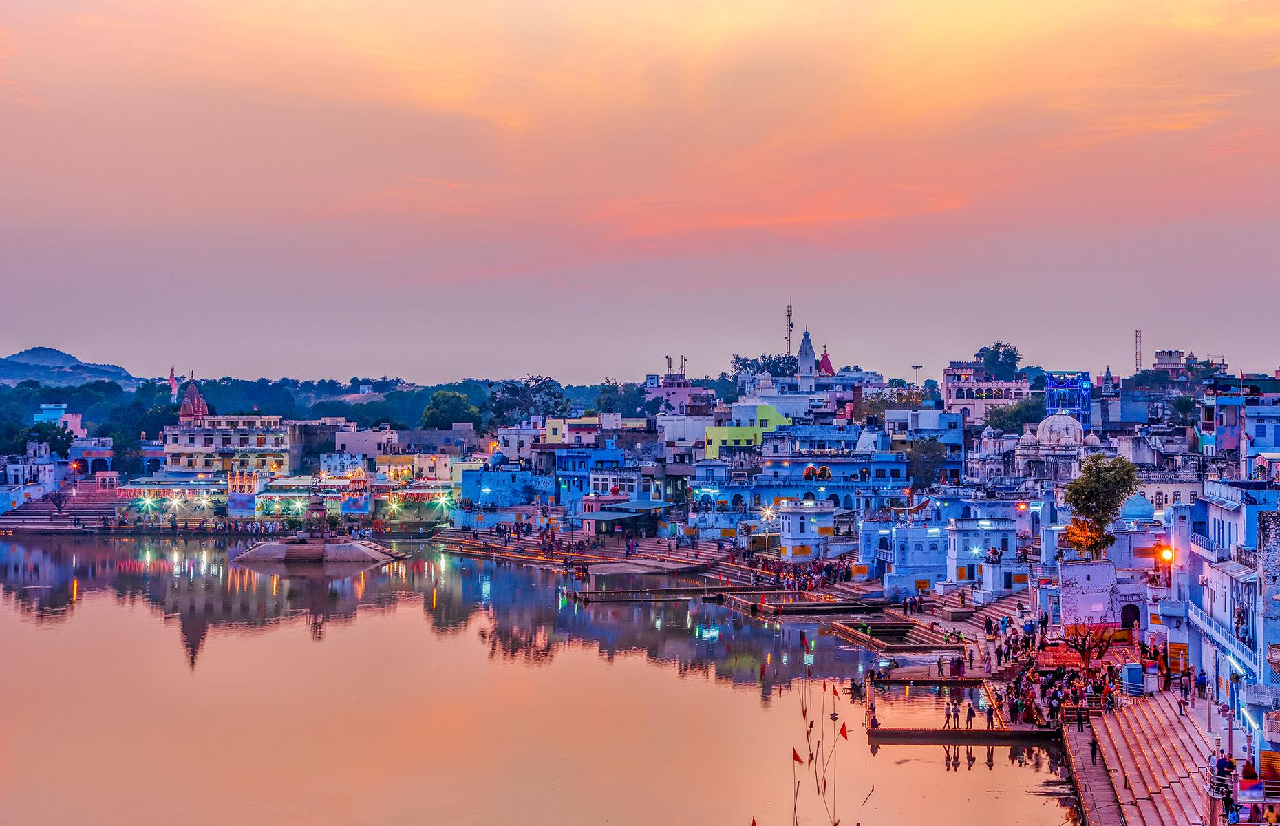 World famous for its November camel fair, in which hundreds of vendors come to sell their camels in the desert just outside the city, there's plenty of reason to visit Pushkar year-round. One of its highlights is Holy Lake, which at dusk is a gorgeous combination of pink skies, glassy waters, and blueish tumbledown houses.