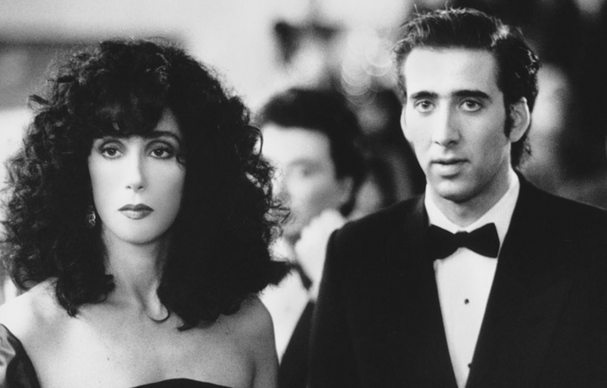 <p>Moonstruck stands out for its portrayal of family and romantic relationships, as well as its charming humor and witty dialogues. Cher received an Academy Award for her performance, and the film has endured as one of the most beloved romantic comedies of its time. Norman Jewison directed the film and Nicolas Cage accompanied the main star.</p> <p>The story follows Loretta Castorini (played by Cher), an Italian widow who agrees to marry Johnny Cammareri (played by Danny Aiello) for convenience. However, the situation becomes complicated when Loretta meets Johnny's brother, Ronny (played by Cage), and they fall in love despite family complications.</p>