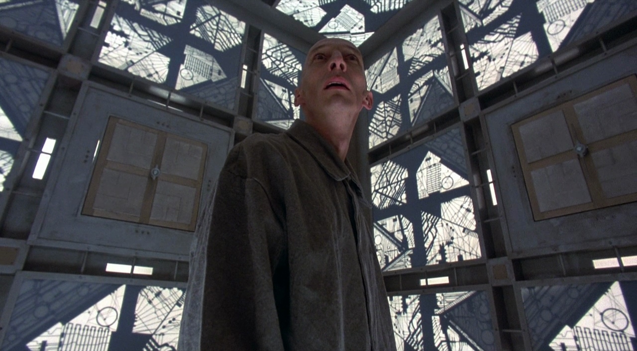 <p><em>Cube</em>, directed by Vincenzo Natali, embarked on a unique journey from cult classic home video oddity to a film that has significantly influenced popular horror and science fiction franchises like the <em>Escape Room</em> series. When it was released in 1997, it was a low-budget Canadian indie film that intrigued viewers with its high-concept premise of strangers trapped in a deadly maze of interconnected rooms.</p>  <p>Initially finding success as a cult classic through word-of-mouth and home video rentals, it eventually gained recognition for its innovative take on the suspense and survival genres.</p>