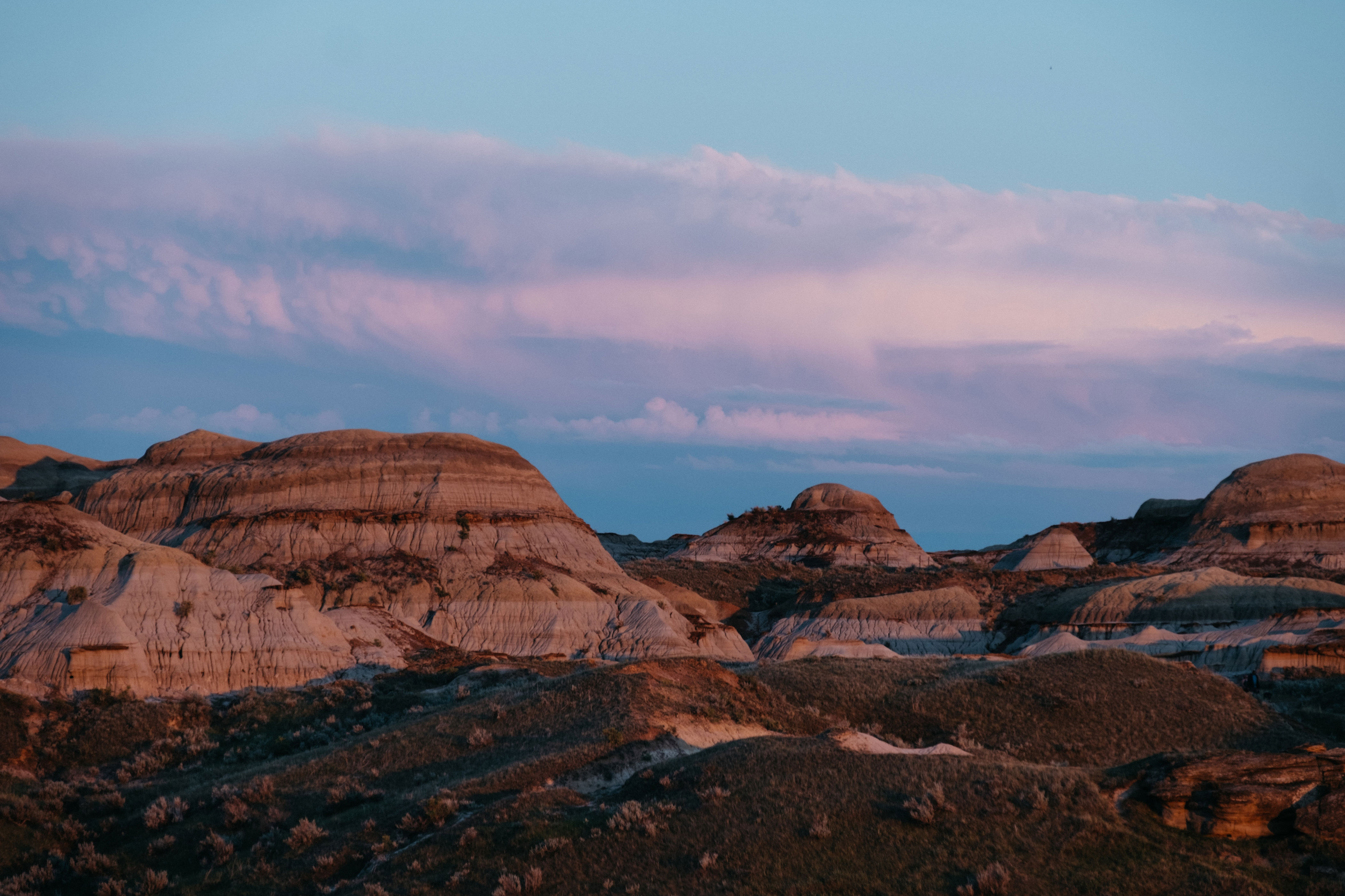 <p>The Alberta Badlands offer a unique landscape that unearths a prehistoric past. The stunning rock formations are a favorite among photographers from all over the world.</p><p>The Royal Tyrrell Museum holds the world’s largest collection of dinosaur fossils.</p><p><strong>Highlights:</strong> Fossil Museum, Hoodoos, Drumheller</p><p><strong>Activities to Enjoy:</strong> Hiking, photography, educational tours</p>