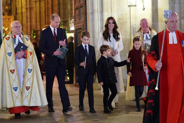 Chris Jackson/Getty Prince William, Prince George, Kate Middleton, Prince Louis and Princess Charlotte at Christmas concert on Dec. 8, 2023