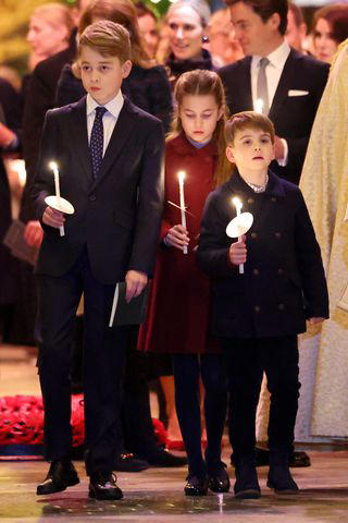 Chris Jackson/Getty Prince George, Princess Charlotte and Prince Louis attend Christmas concert on Dec. 8, 2023