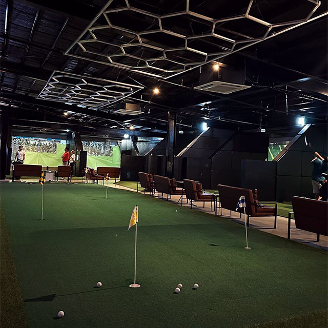 practice your swings and chill at this indoor golf complex in pasig