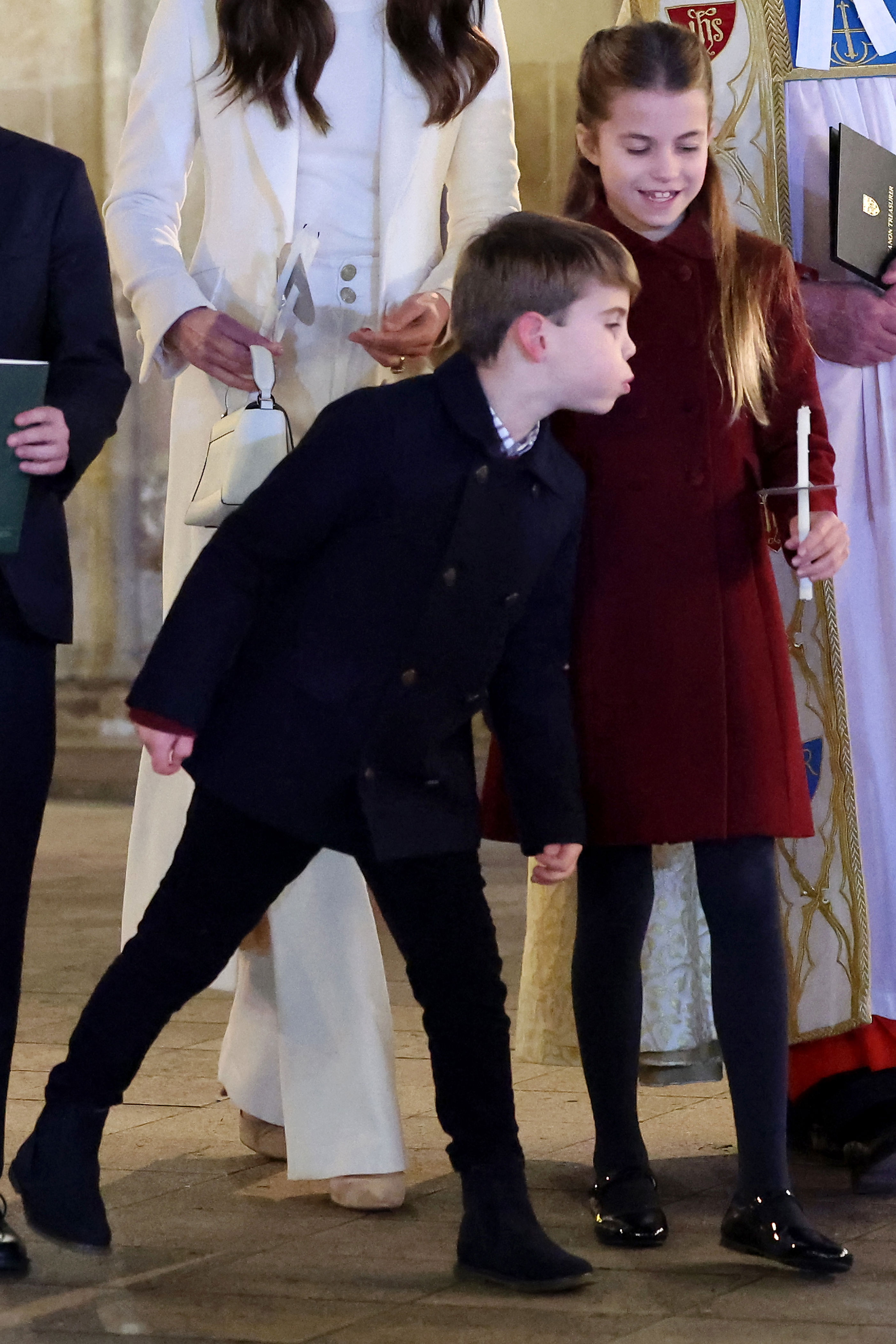 <p><span>Notorious royal rascal Prince Louis playfully blew out big sister Princess Charlotte's candle at the </span><a href="https://www.wonderwall.com/celebrity/photos/see-the-best-pictures-from-the-royal-christmas-carol-service-2023-819436.gallery">Together At Christmas carol service</a><span> -- which is spearheaded by the Princess of Wales and supported by The Royal Foundation -- at Westminster Abbey in London on Dec. 8, 2023. </span></p><p>Keep reading to see the Wales trio when all their candles were aflame...</p><p>MORE: <a href="https://www.wonderwall.com/celebrity/photos/see-the-best-pictures-from-the-royal-christmas-carol-service-2023-819436.gallery">See the best photos of the royal family at the 2023 Christmas carol service</a></p>