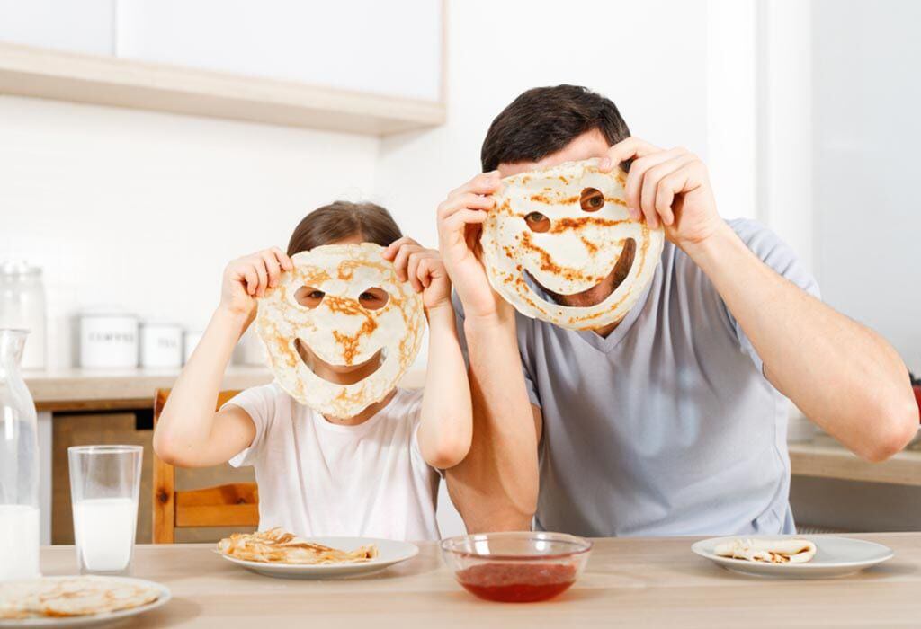 My father makes breakfast. Семья с блинами на лице фото. Блины для детей. Блинчики для детей.