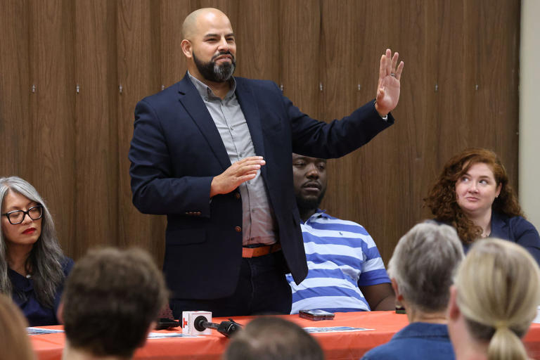 Chicago Ald. Andre Vasquez, 40th, comments during a public safety community meeting at North Shore Baptist Church in Chicago on Sept. 26, 2023. Ald. Leni Manaa-Hoppenworth, 48th, is at left.