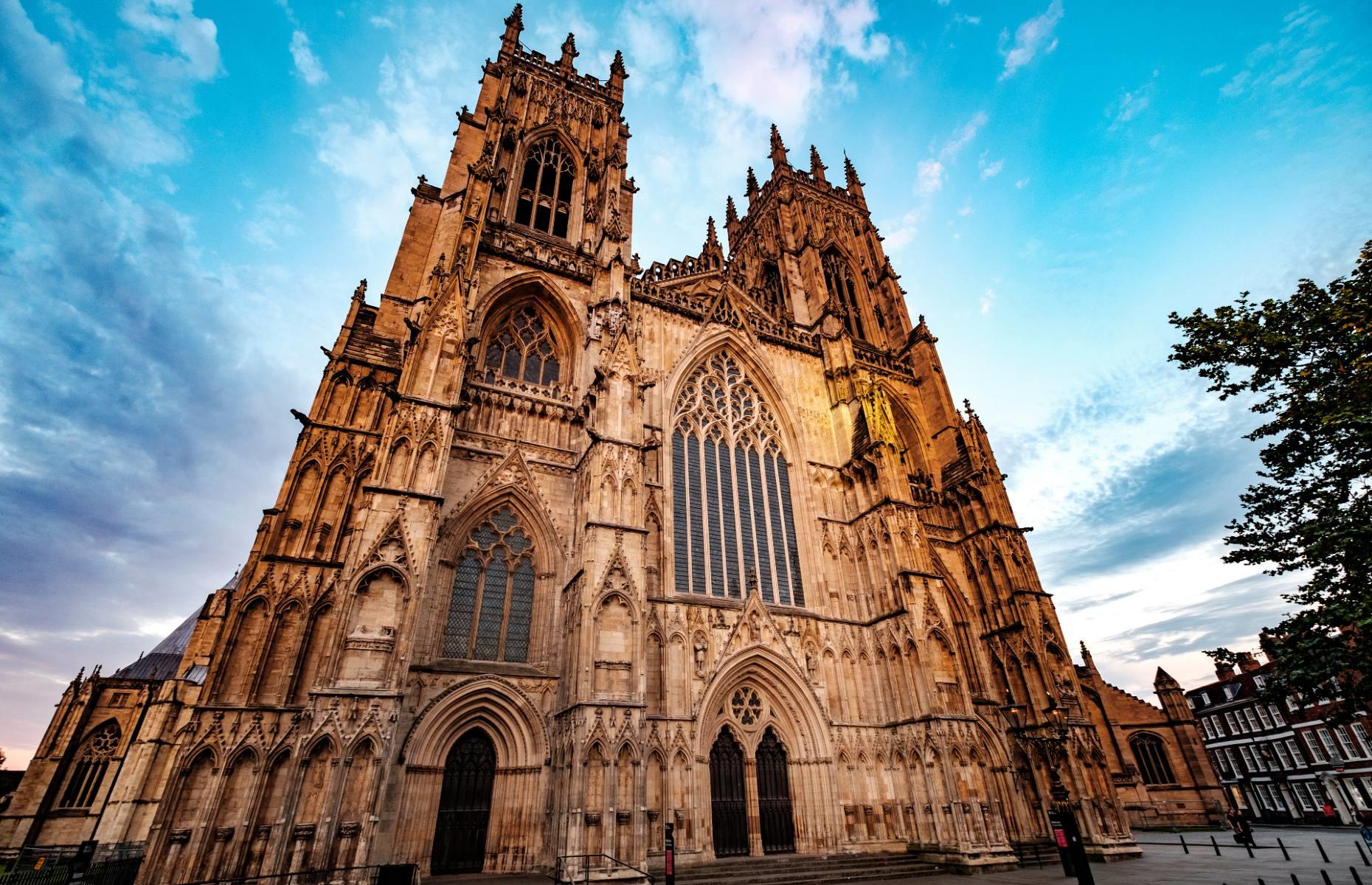 <p>Towering high above York, this magnificent Gothic building is one of the biggest medieval cathedrals in Europe. A masterpiece of stained glass and stone, its recently restored Great East Window dates back to 1405 and is the country’s largest example of medieval stained glass. <a href="https://yorkminster.org/">York Minster</a>’s stunning tower offers visitors incredible views across the historic city.</p>