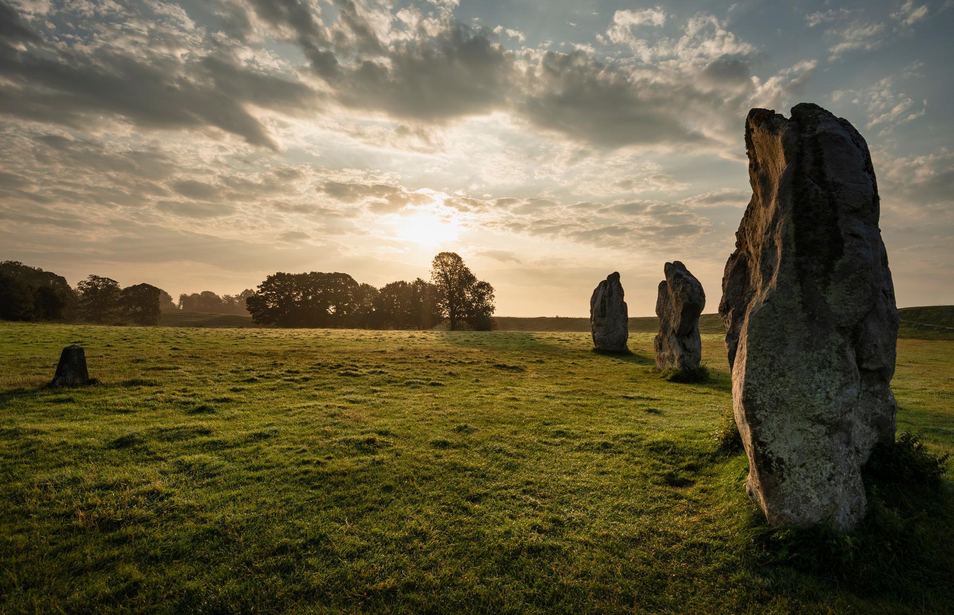 <p>Close to the more famous Stonehenge but equally fascinating, <a href="https://www.english-heritage.org.uk/visit/places/avebury/">Avebury</a> is a sprawling Neolithic complex that includes the largest stone circle in Britain. Originally made from around 100 stones, the site was erected and often altered over six centuries from 2850 BC. Avebury’s spectacular remains include banks, ditches and three stone circles.</p>