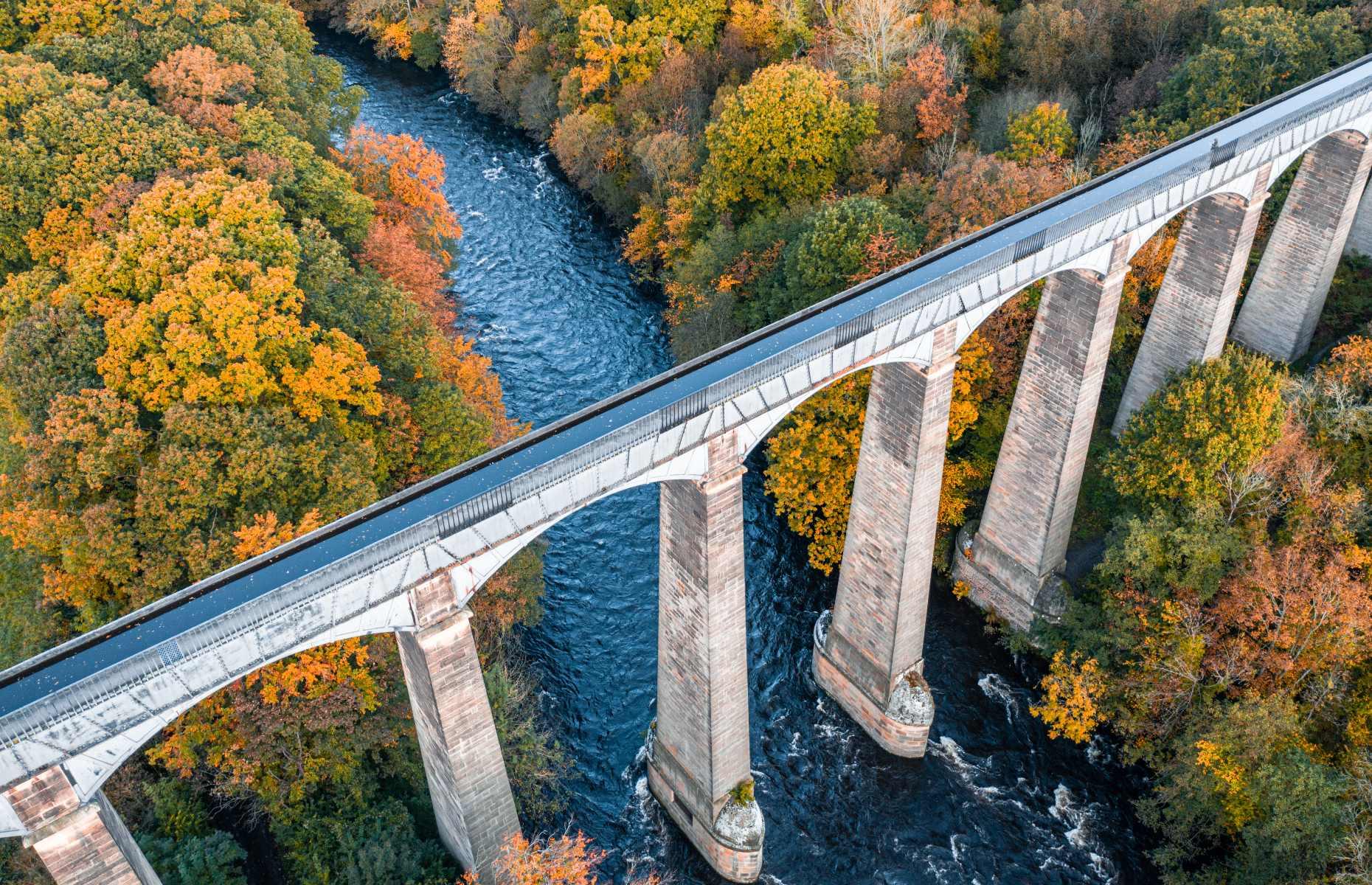 <p>Soaring high above the Vale of Llangollen, the <a href="https://www.pontcysyllte-aqueduct.co.uk/">Pontcysyllte Aqueduct</a>, meaning 'the bridge that connects', trails across the River Dee in northeast Wales. The bridge was designed by Thomas Telford and William Jessop in 1805. Nicknamed 'the stream in the sky', the historic bridge and 11 miles of canal are now a UNESCO-listed site and are considered a triumph of civil engineering.</p>