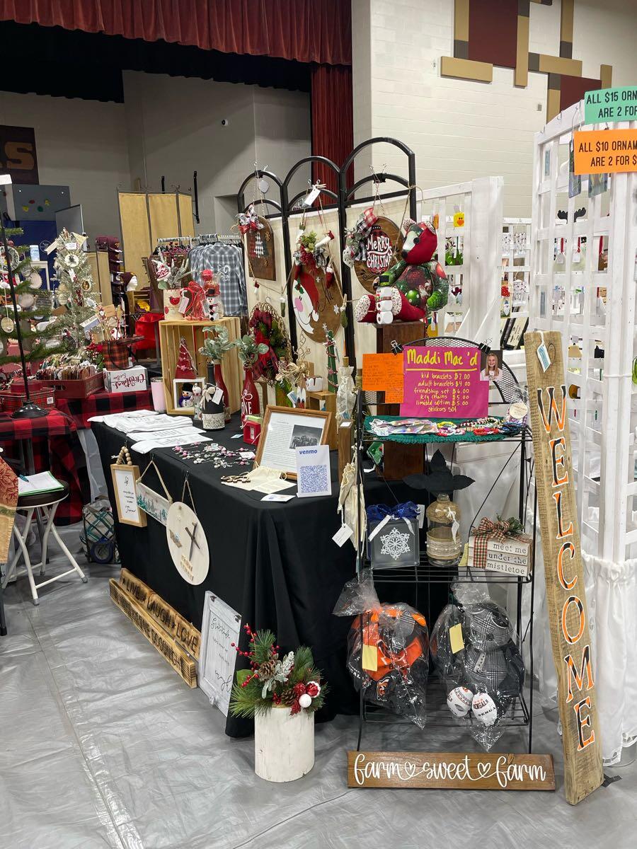 Set up at the Ross Middle School craft show today from 104