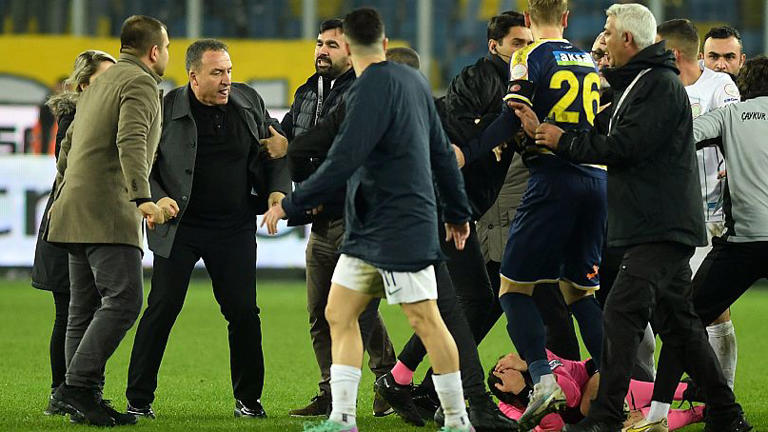 Three men arrested and Turkish league games suspended after referee ...