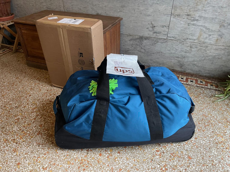 Is shipping luggage better than checking bags? We tried it 4 ways.