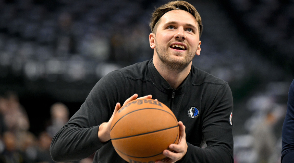 Luka Doncic Made a Half Court Shot That Left His Coaches Doing Push Ups