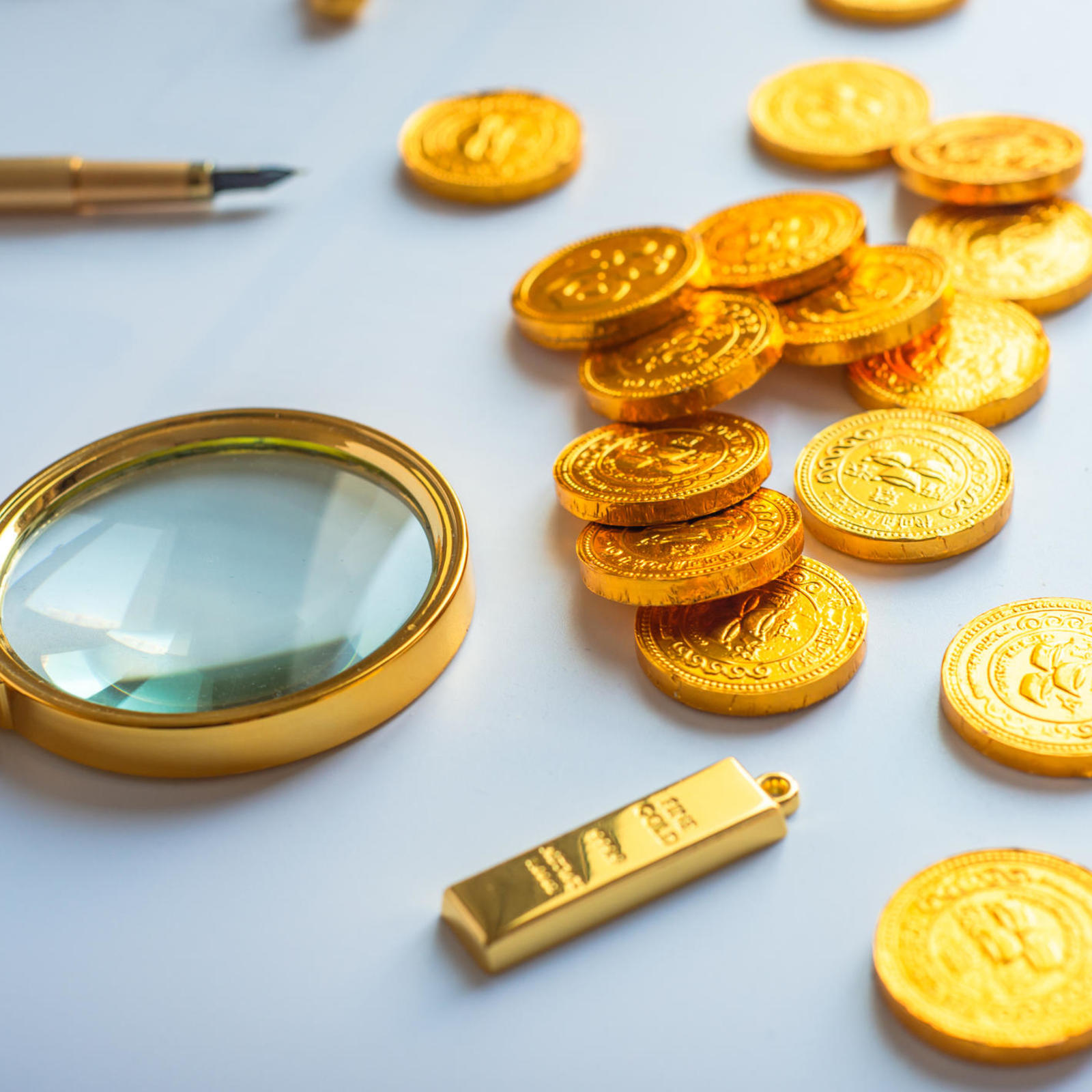 Gold Prices Are Down From A Record High. Should You Invest Now?