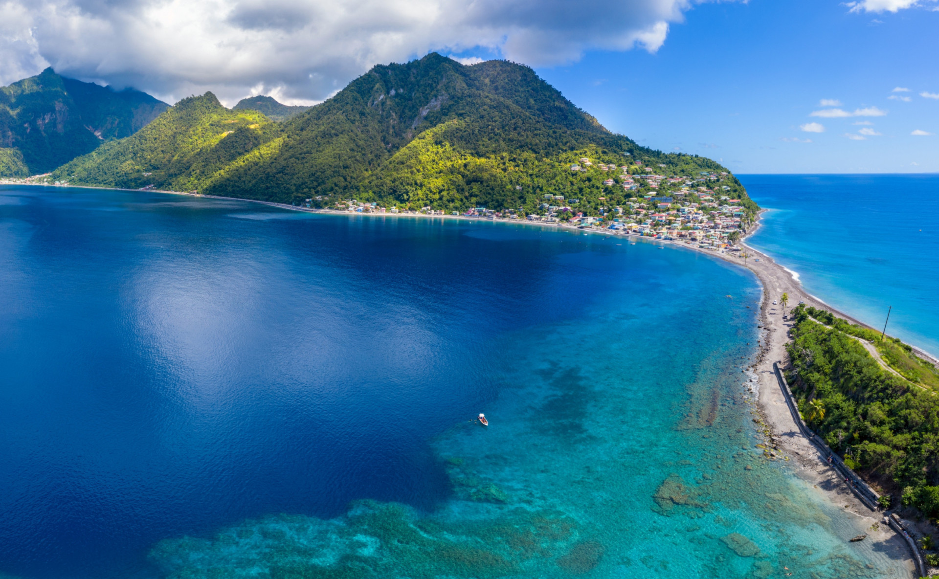<p>Not to be confused with the Dominican Republic, the verdant island nation of Dominica is an ocean paradise blanketed with rainforest and textured by cascading waterfalls, hot springs, and golden sand. Its eco-friendly hotels and resorts are the envy of the region.</p>