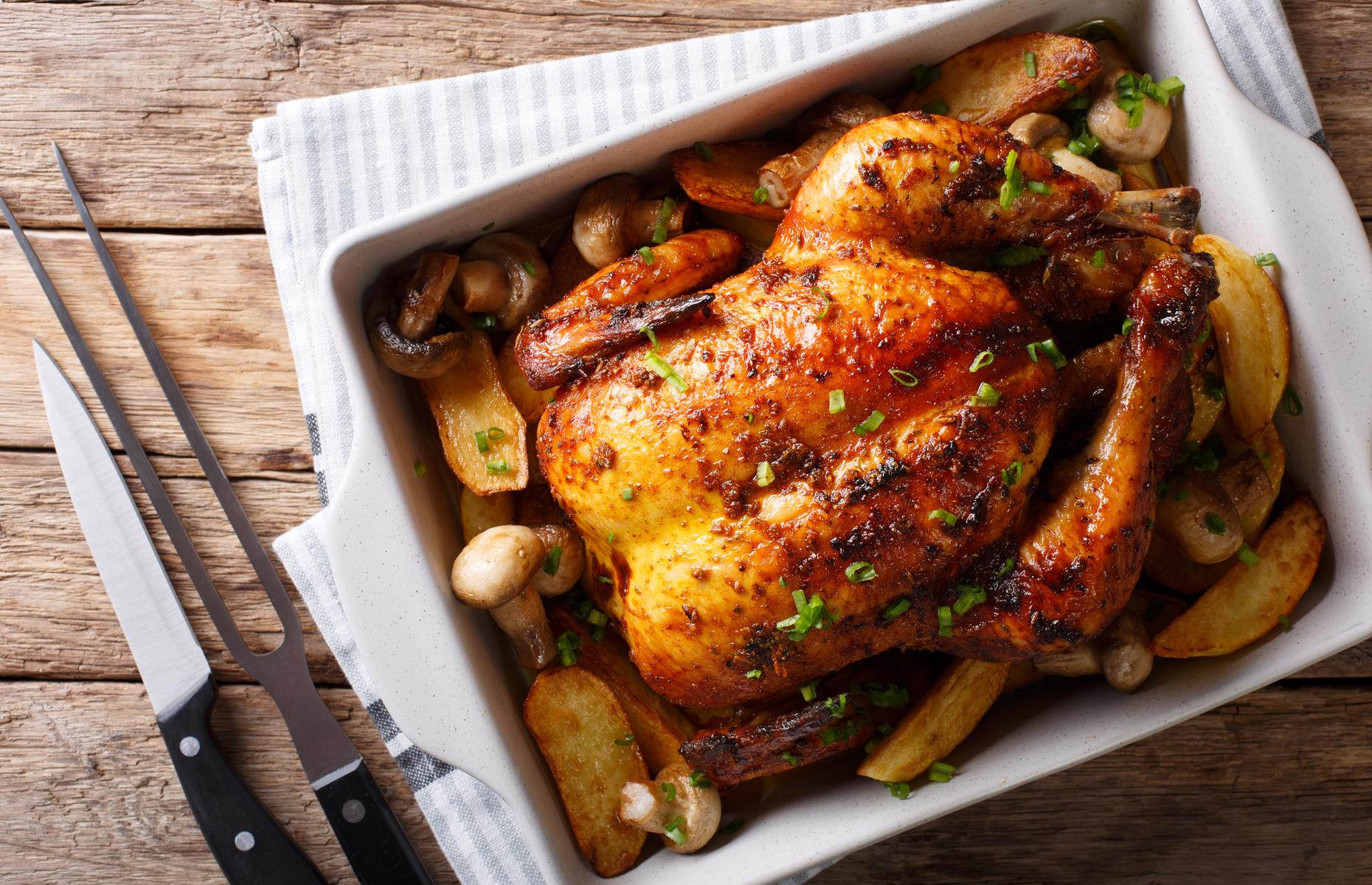 <p>Schmaltz is the Yiddish word for chicken or goose fat. For perfectly crisp roast chicken skin, Nigella suggests you take the nugget of fat out of the cavity of the chicken, render it down to a liquid in a small saucepan, then brush it over the bird before cooking.</p>