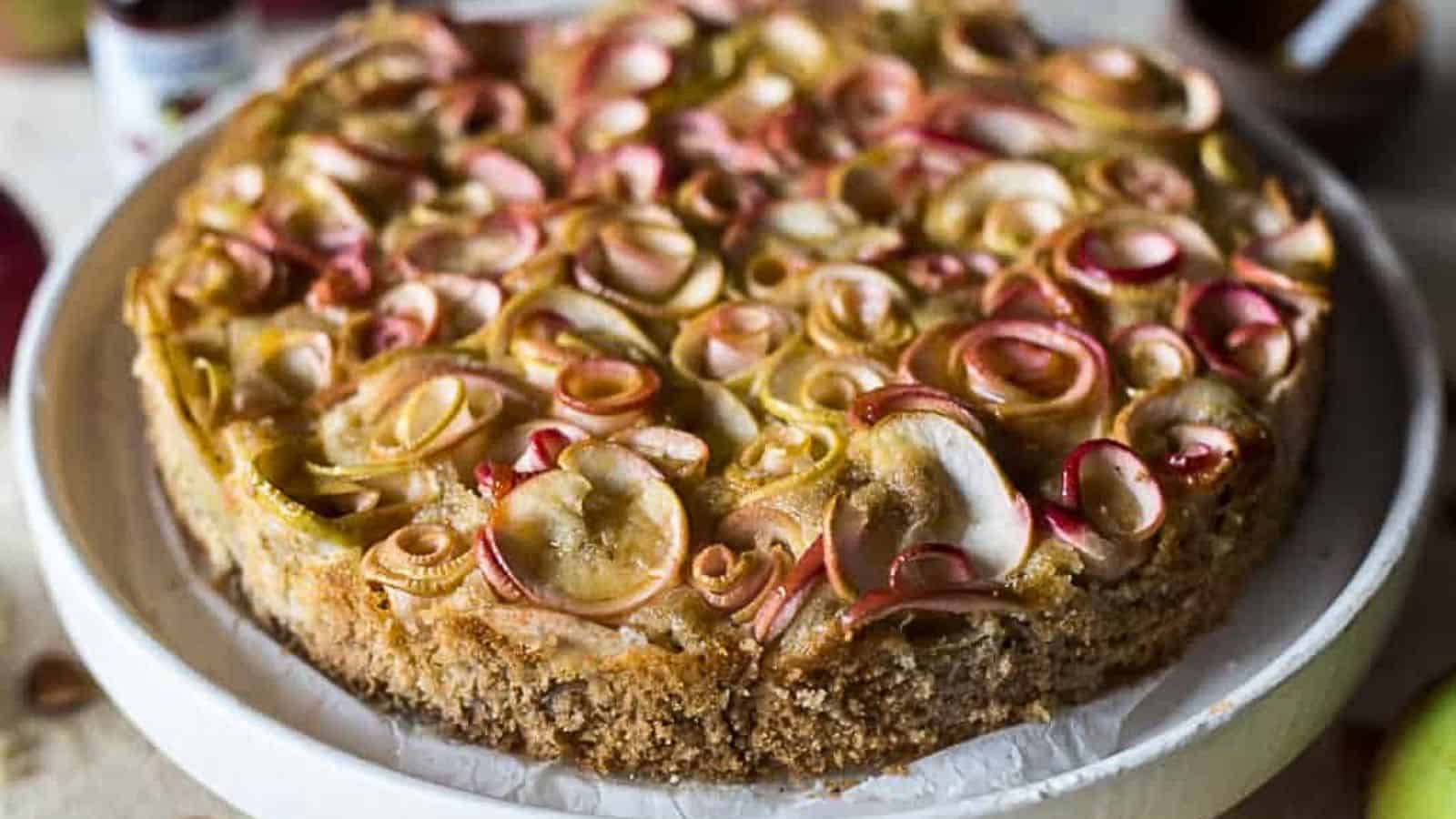 <p>Highlight your Hanukkah dessert table with elegance and flavor by serving almond apple cake with apple roses. This visually stunning dessert captivates with rose-shaped apples and delights the palate with the nutty and fruity goodness of almond and apple, making your celebration sweet and sophisticated.<br><strong>Get the Recipe: </strong><a href="https://immigrantstable.com/almond-apple-cake-with-apple-roses-rosh-hashana/?utm_source=msn&utm_medium=page&utm_campaign=25%20hanukkah%20desserts%20that%20guarantee%20a%20sweet%20celebration">Almond Apple Cake with Apple Roses</a></p>