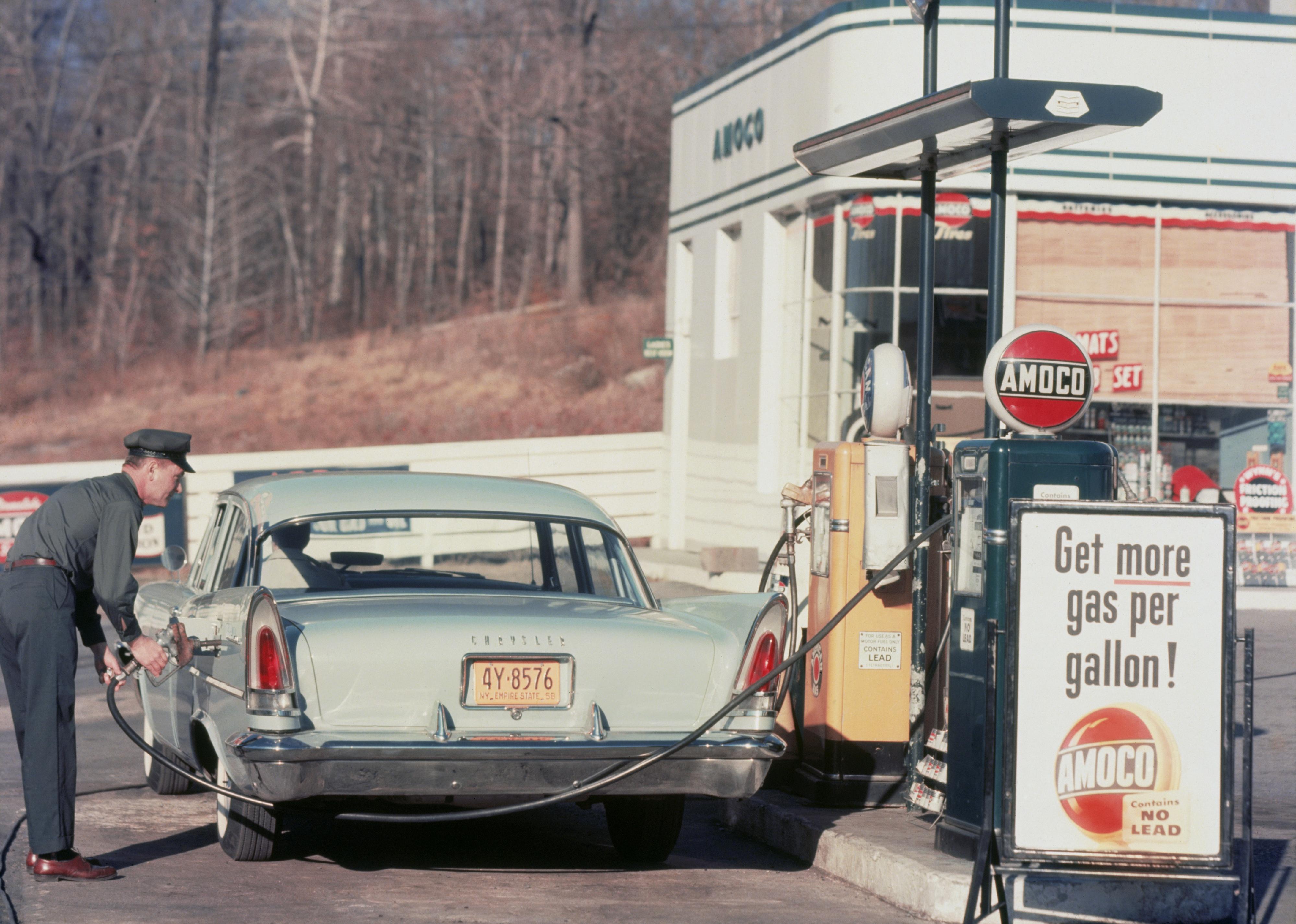 <p>In the early part of the 20th century, most gas stations were manned with attendants who would pump your fuel and collect your payments (which is now only the case in New Jersey). The first self-service station opened in Los Angeles in 1947,  but it wasn't until the 1970s that self-service stations became the norm.</p>