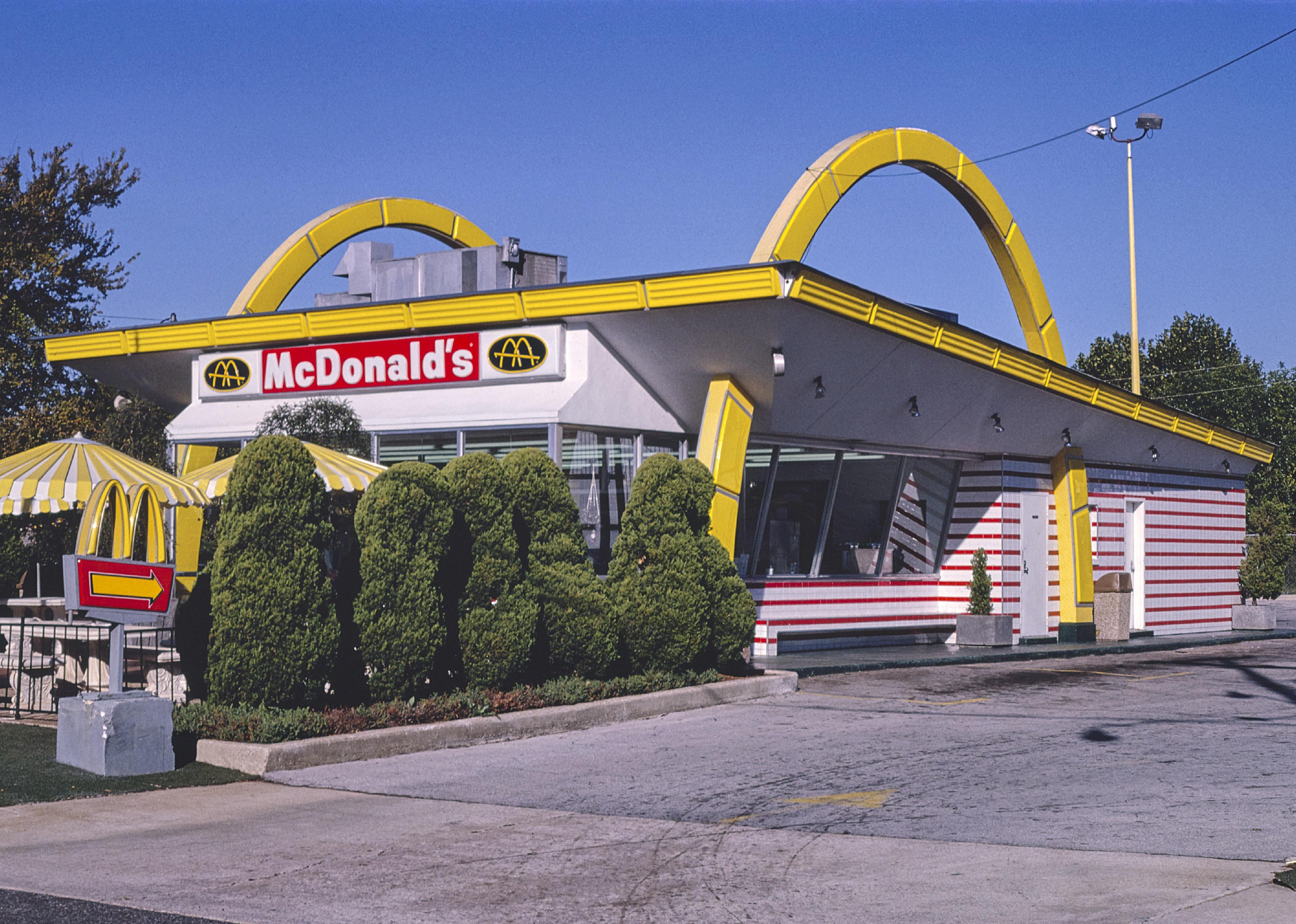 <p>The golden arches and their cheap, quick meal options welcome road trippers off Route 11 in Birmingham, Alabama, in 1980.</p>