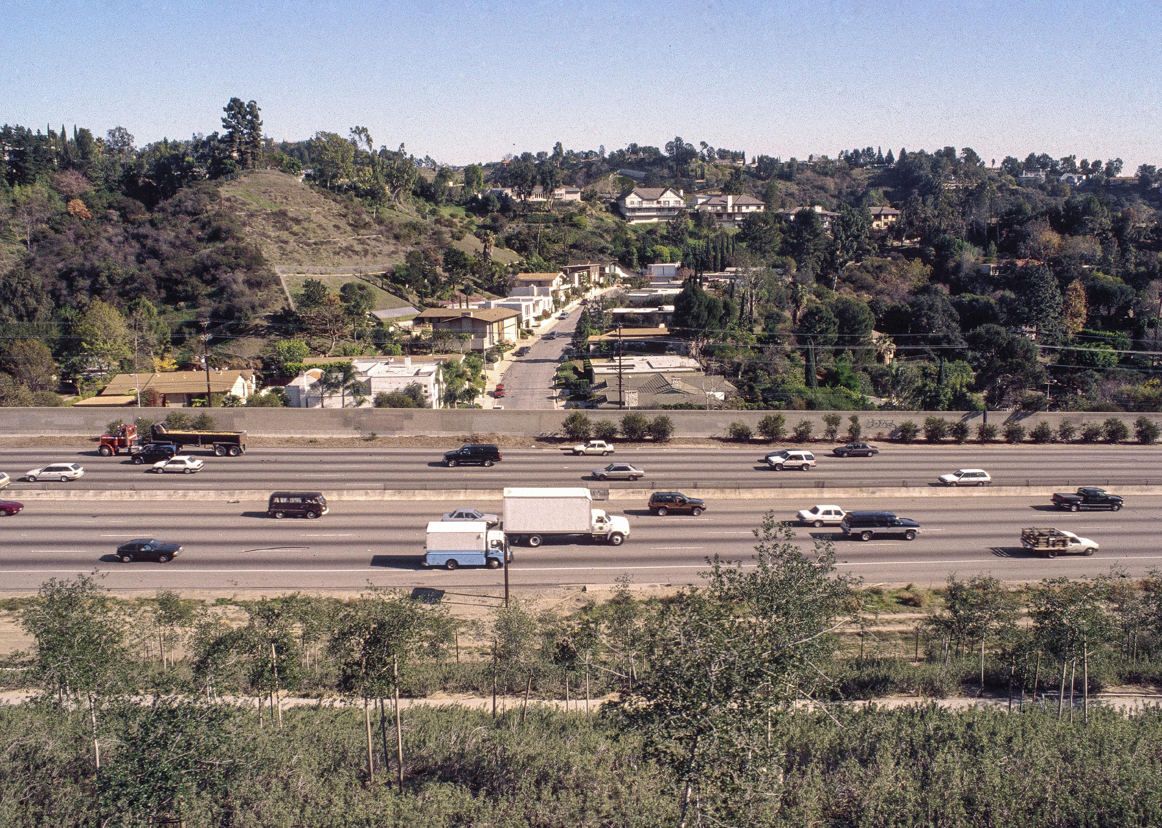 <p>Long stretches of America's highway system are fairly desolate, where the only things visible out the window are rolling hills and free-roaming cattle. Once in a while, however, the interstate will cut through busy city centers, like this piece of the 405 in Los Angeles, making for much more exciting window-watching.</p>