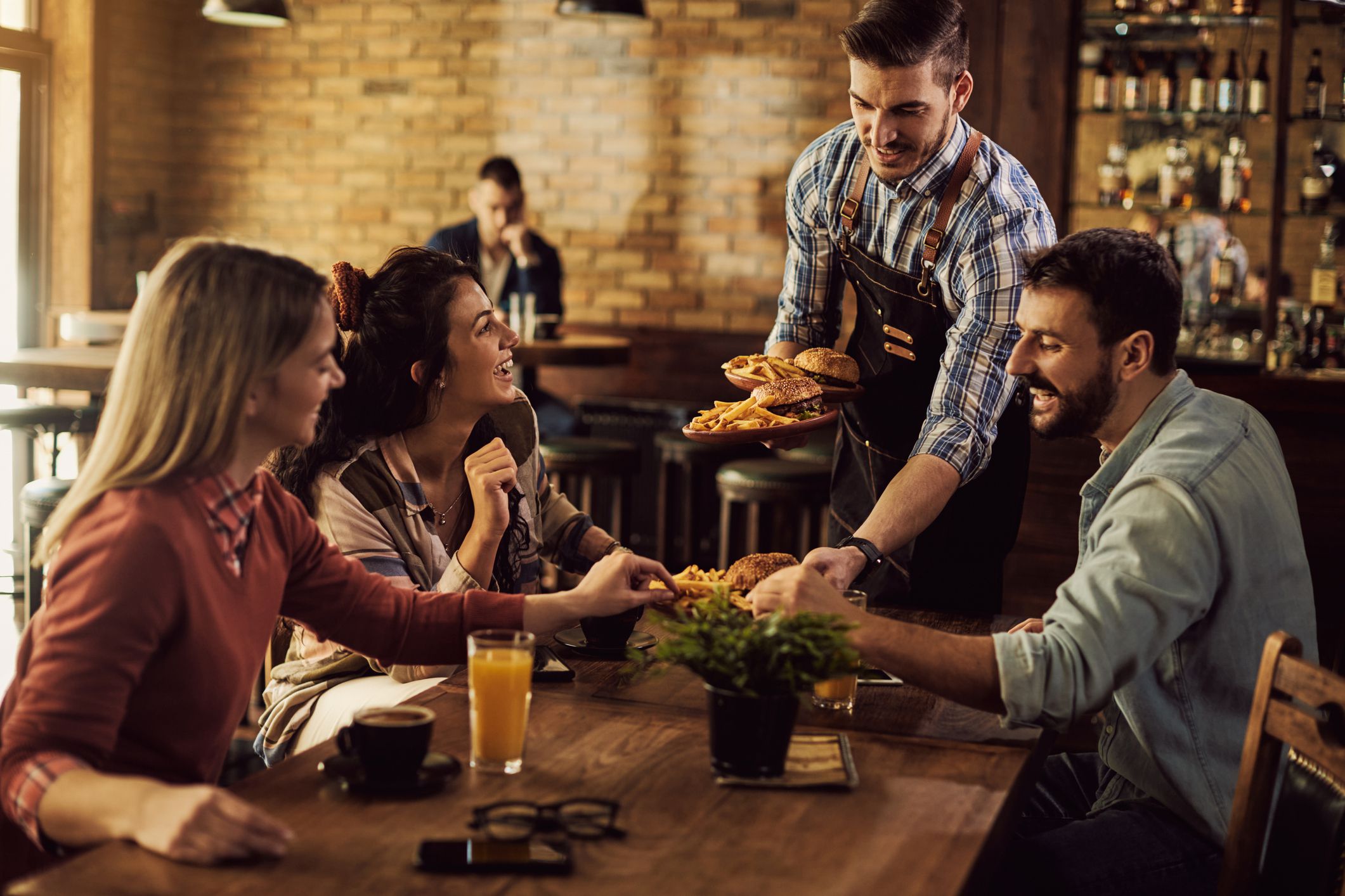 <p>Servers often have to rely heavily on tips, as their <a href="https://www.zippia.com/food-service-worker-jobs/salary/">base wage can be quite low</a>. For sit-down dining, tipping 15-20% of the total bill before taxes is standard practice. If you feel like the service was exceptional, you can always tip more. But generally, tipping 18% is considered pretty generous. For buffet settings, 10% is usually a fair amount. </p>
