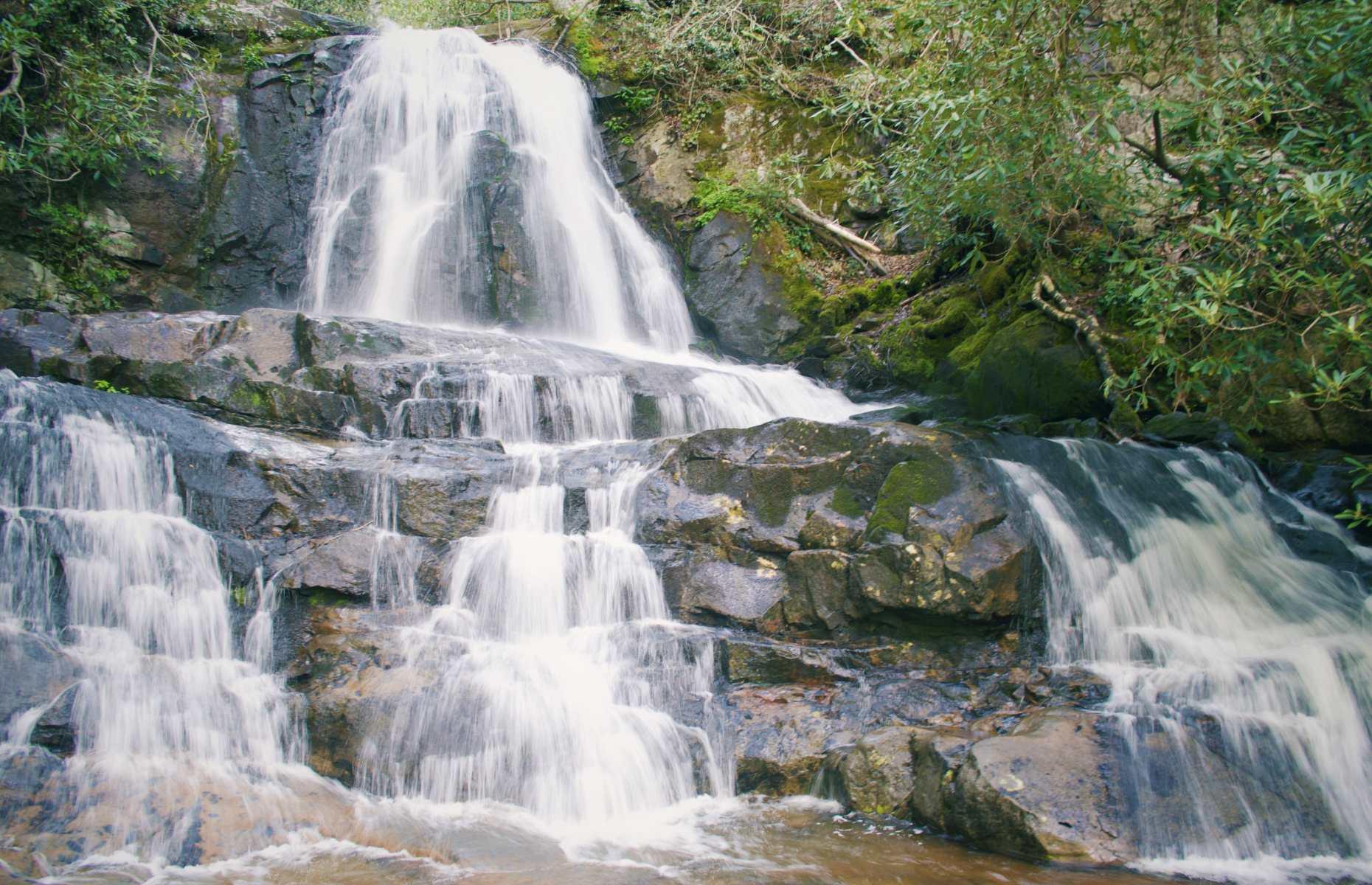 <p>You’re never far from a waterfall in the Great Smokies. The tallest in the park is Ramsey Cascades, accessible via an eight-mile hike, though there are others far easier to reach – and still impressive in their own right. Two-tiered Laurel Falls (pictured) is just over a two-and-a-half-mile round-trip on mostly asphalt paths, making it the perfect excursion for young families. The Smoky Mountains’ most voluminous cascade is Abrams Falls, which is small (20ft high) but mighty.</p>