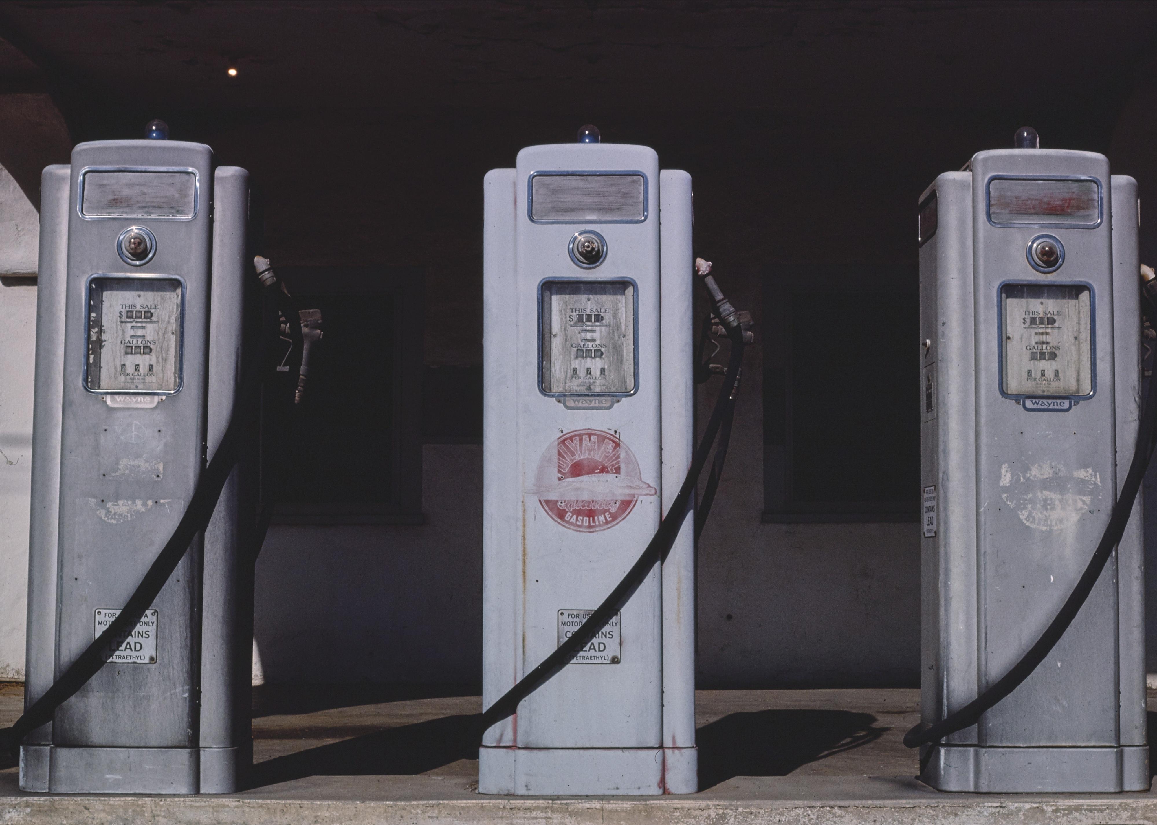 <p>In 1964, an inventor named Herb Timms created a system that allowed a single attendant to control all the pumps at a gas station from a remote location. The pumps pictured here at a San Diego gas station are early examples of self-service stations.</p>