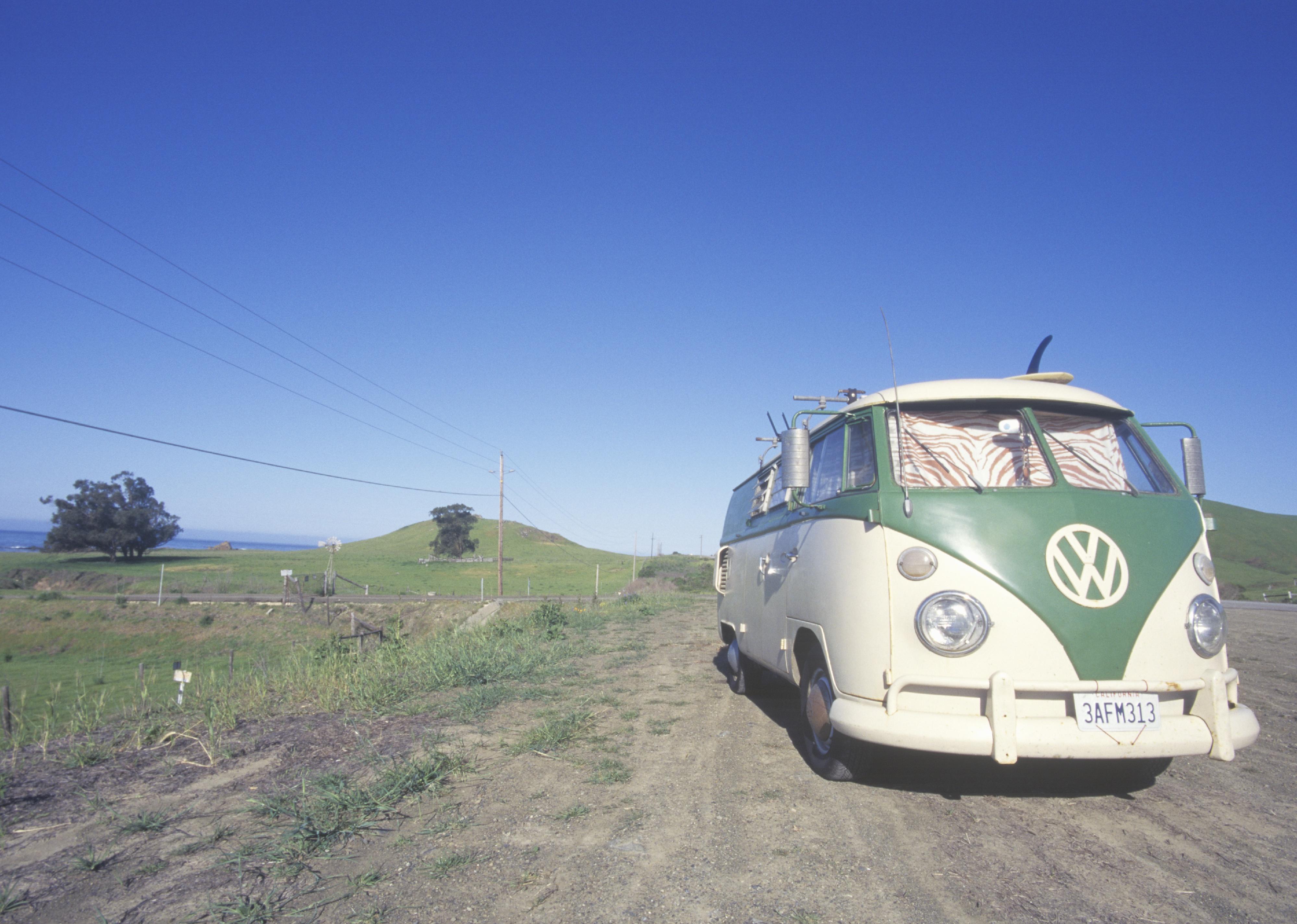 <p>The Volkswagen Microbus became a symbol of the counterculture almost as soon as it rolled off the assembly line in 1950. Here, a road tripper camps in their bus on a roadside in California.</p>