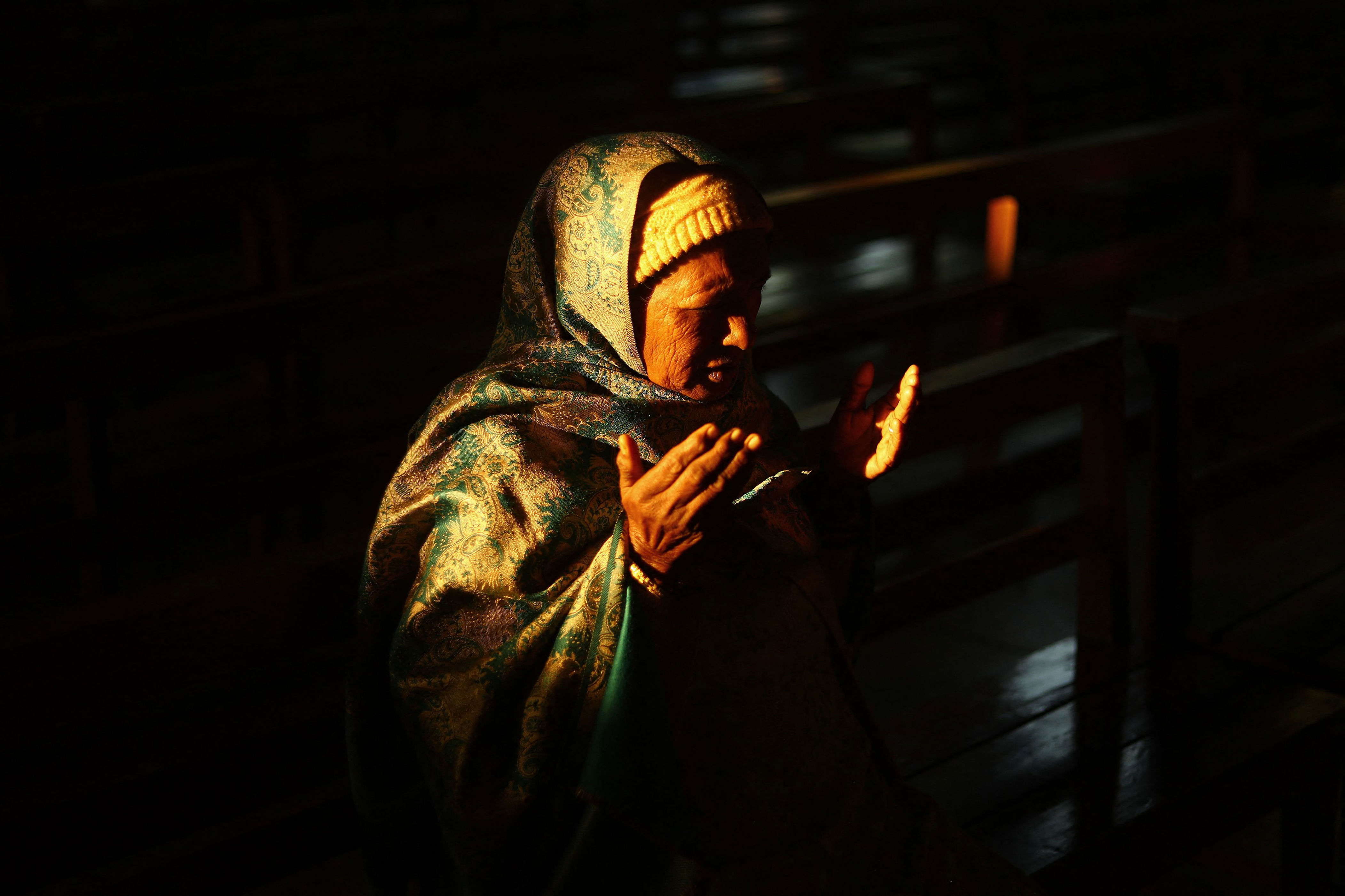 today's best photos: midnight mass, from chandigarh to surabaya