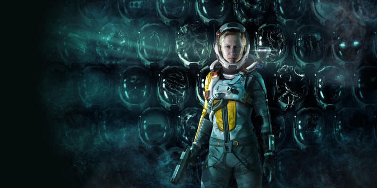 A person in a futuristic space suit is surrounded with strange orbs that look like helmets.