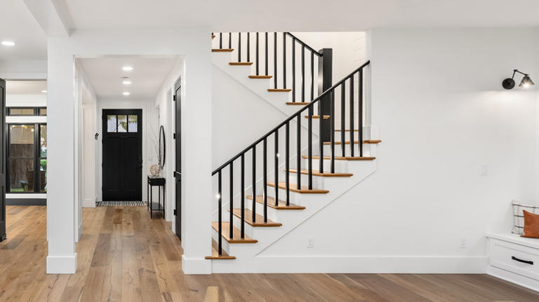 Clever Ways To Repurpose Unused Under-Stairs Spaces