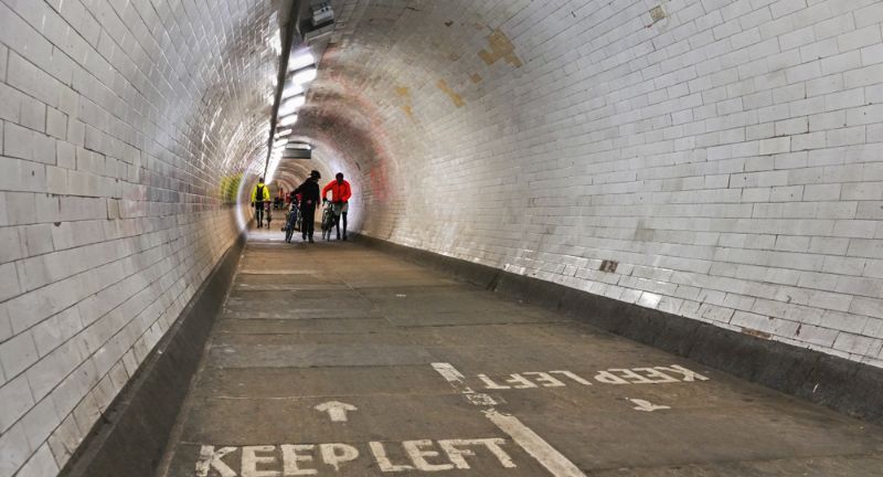 <p>Opened in 1902, the Greenwich Foot Tunnel is a pedestrian tunnel beneath the River Thames in London, connecting Greenwich and the Isle of Dogs. Originally designed for dockworkers, it now serves as a convenient and historic route for pedestrians and cyclists.</p>