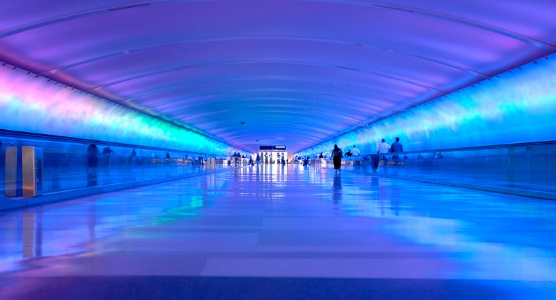 <p>Serving as both an art installation and a transportation corridor, the Light Tunnel at Detroit Metropolitan Airport features a mesmerizing display of colorful lights and music. Completed in 2002, it connects the airport’s Concourse A with the McNamara Terminal.</p>